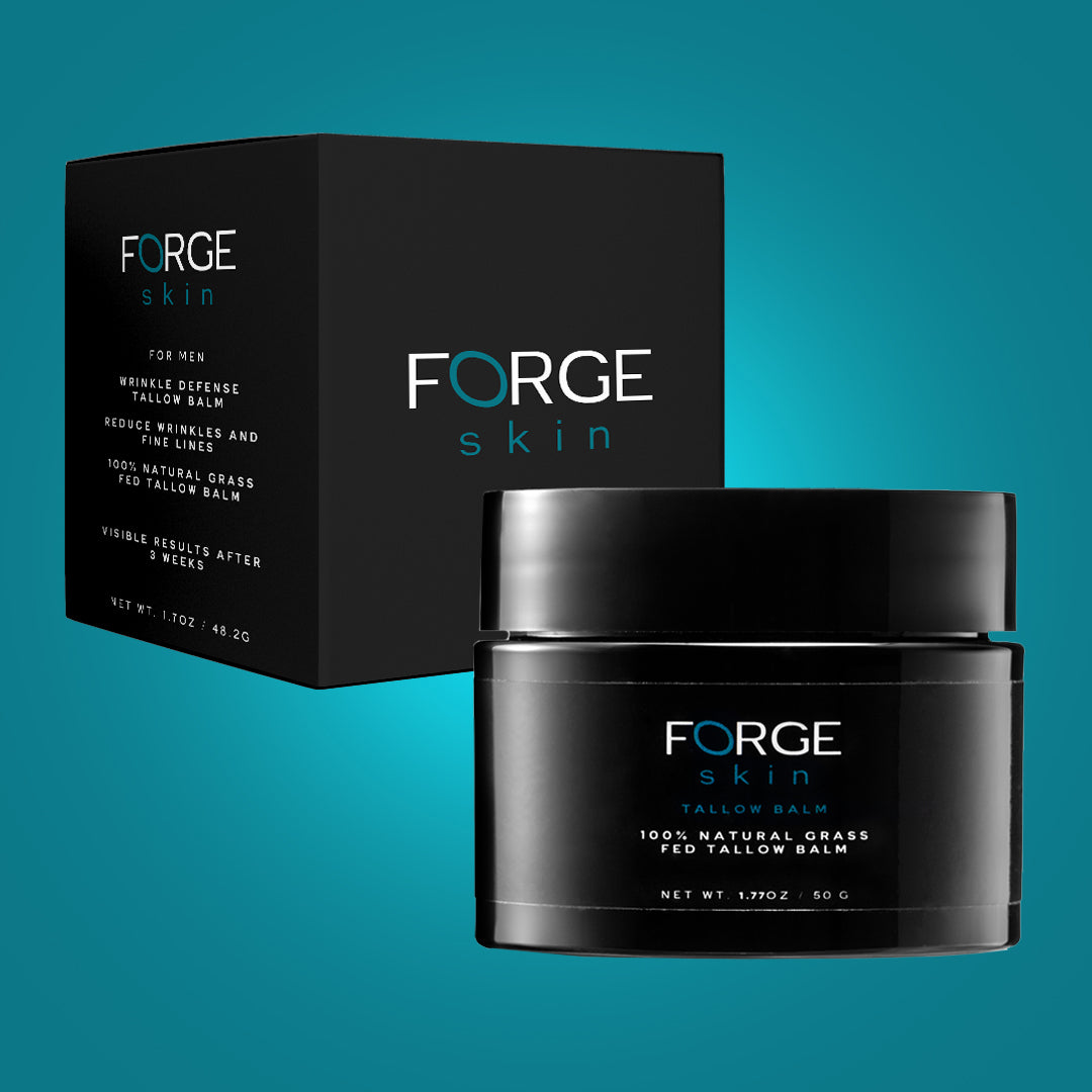 Hand holding a jar of Forge for Men styling balm against a grey background.